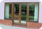 Example of glazed hardwood french doors